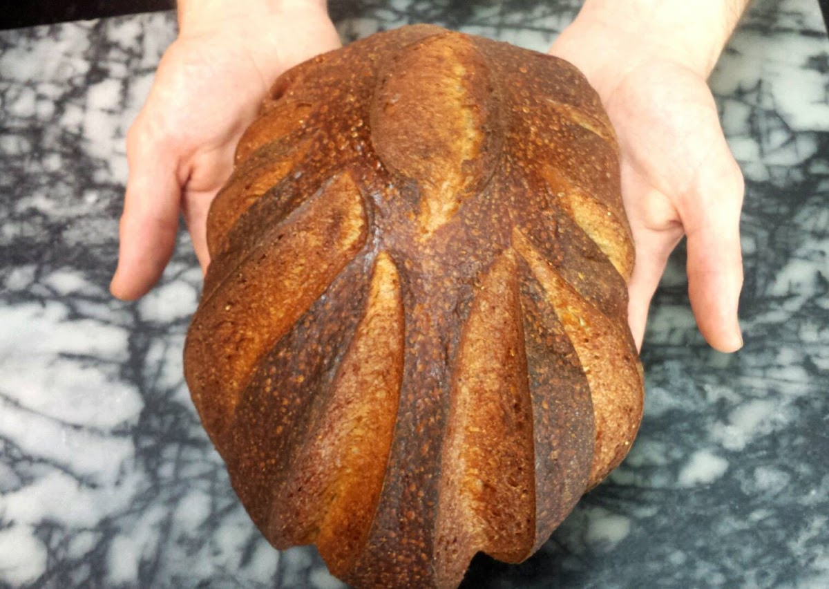 A hand-scored artisan loaf, fresh from Vinman's Bakery